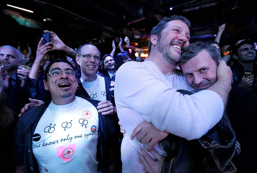 Partygoers react at an Election Night party in Baltimore on Nov. 6, 2012, after voters passed a referendum approving same sex marriage in Maryland. (Associated Press)