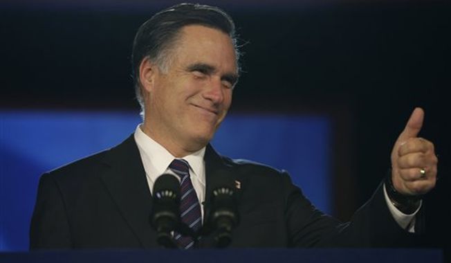Republican presidential candidate Mitt Romney gives a thumbs up as he arrives to give his concession speech during his election night rally in Boston on Nov. 7, 2012. (Associated Press)