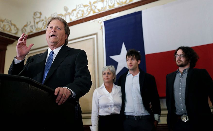 Democratic candidate for U.S. Senate Paul Sadler, left, makes a concession speech at the Texas Democratic Party election watch party, Tuesday, Nov. 6, 2012, in Austin, Texas. With Sadler, from left, are his wife, Sherri, and sons Joel and Lee. (AP Photo/Eric Gay)