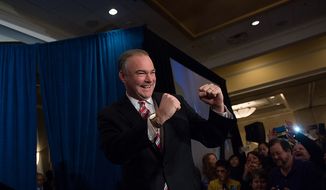 Tim Kaine, Democrat and former Virginia governor, arrives Nov. 6, 2012, to a cheering audience at his election night party at the Richmond Marriott in Richmond, Va., after defeating George Allen in the race for the U.S. Senate seat of the retiring Jim Webb. (Andrew Harnik/The Washington Times)