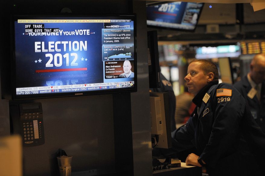 A trader works on the floor of the New York Stock Exchange in New York on Wednesday, Nov. 7, 2012, the day after President Obama was re-elected. (AP Photo/Henny Ray Abrams)