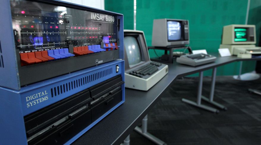 In this photo taken Oct. 30, 2012, an IMSAI 8080 personal computer from 1975 is shown next to other personal computers from the early years of the devices, at the Living Computer Museum in Seattle. (AP Photo/Ted S. Warren)