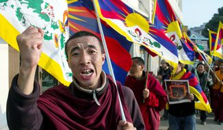 An exiled Tibetan Buddhist in Dharmsala, India, protests Chinese rule. Since March 2011, dozens of ethnic Tibetans have set themselves on fire in ethnically Tibetan areas to protest China’s perceived repression.