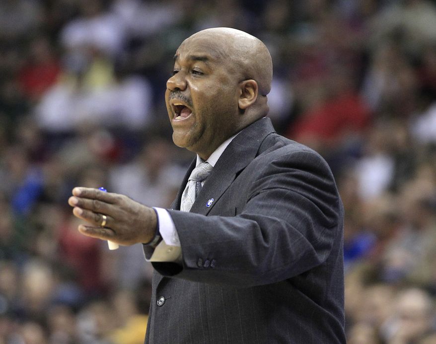 FILE - In this March 18, 2012 file photo, Georgetown University head basketball coach John Thompson III reacts during  a basketball game in Columbus, Ohio. There is not a single senior on coach Thompson's roster. And only two juniors are expected to see significant minutes. their best player is Otto Porter, a sophomore. Two other members of the starting lineup also could be guys who were freshmen a year ago, Greg Whittington and Mikael Hopkins.  (AP Photo/Tony Dejak, File)