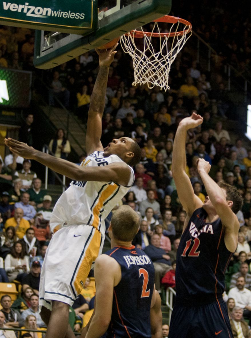 George Mason Patriots forward Paris Bennett (1) makes a lay up against the Virginia Cavaliers in the second half at the Patriot Center in Fairfax, Va., Wednesday, November 9, 2012. George Mason Patriots host the Virginia Cavaliers for the 2012-2013 men's college basketball season opener. (Craig Bisacre/The Washington Times)