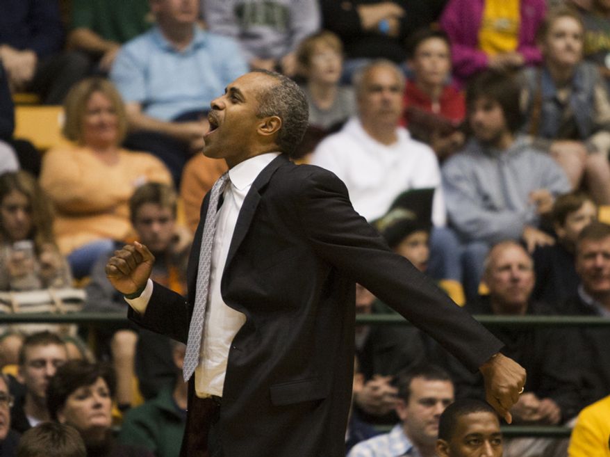 George Mason Patriots head coach Paul Hewitt reacts to a call in the first half against the Virginia Cavaliers at the Patriot Center in Fairfax, Va., Wednesday, November 9, 2012. George Mason Patriots host the Virginia Cavaliers for the 2012-2013 men's college basketball season opener. (Craig Bisacre/The Washington Times)