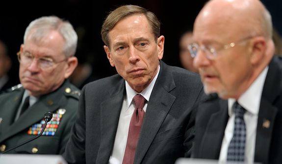 From left: Defense Intelligence Agency Director Army Lt. Gen. Ronald Burgess, CIA Director David Petraeus and Director of National Intelligence James Clapper testify on Capitol Hill in Washington on Feb. 2, 2012, before the House Intelligence Committee hearing on worldwide threats. (Associated Press)