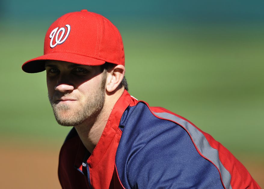 Nationals outfielder Bryce Harper is the favorite to win the Baseball Writers Association of America's Rookie of the Year award over Reds infielder Todd Frazier and Diamondbacks pitcher Wade Miley. (Associated Press)