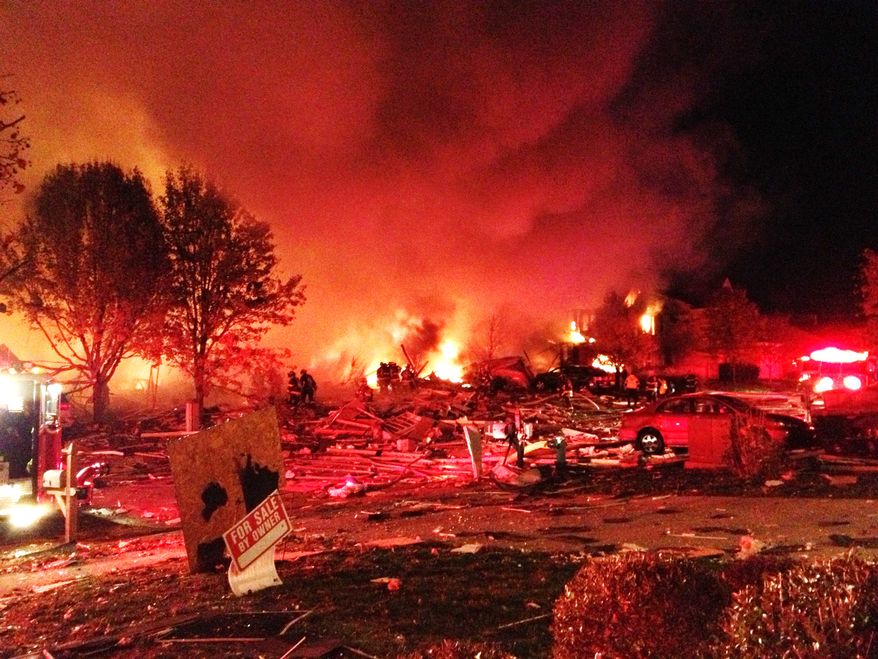 A loud explosion Nov. 10, 2012, in the Richmond Hill subdivision in Indianapolis killed two people and damaged more than a dozen homes, authorities said. (Associated Press/The Indianapolis Star)