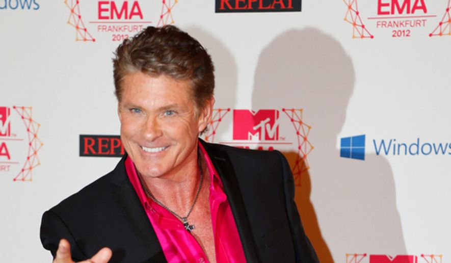 US actor David Hasselhoff arrives on the red carpet of the 2012 MTV European Music Awards show at the Festhalle in Frankfurt, central Germany, Sunday, Nov. 11, 2012. (AP Photo/Frank Augstein)