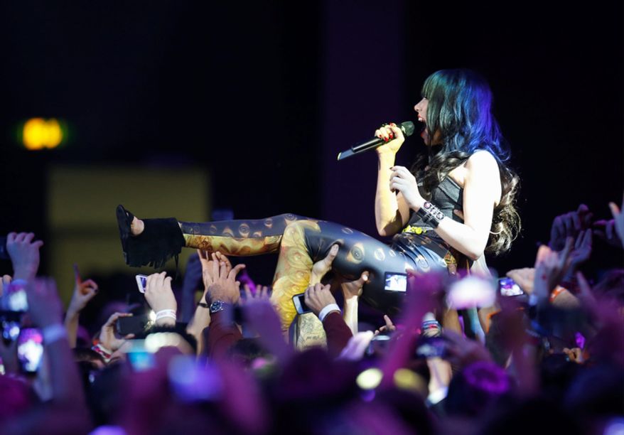 Canadian singer Carly Rae Jepsen performs during the 2012 MTV European Music Awards show at the Festhalle in Frankfurt, central Germany, Sunday, Nov. 11, 2012. (AP Photo/Michael Probst)