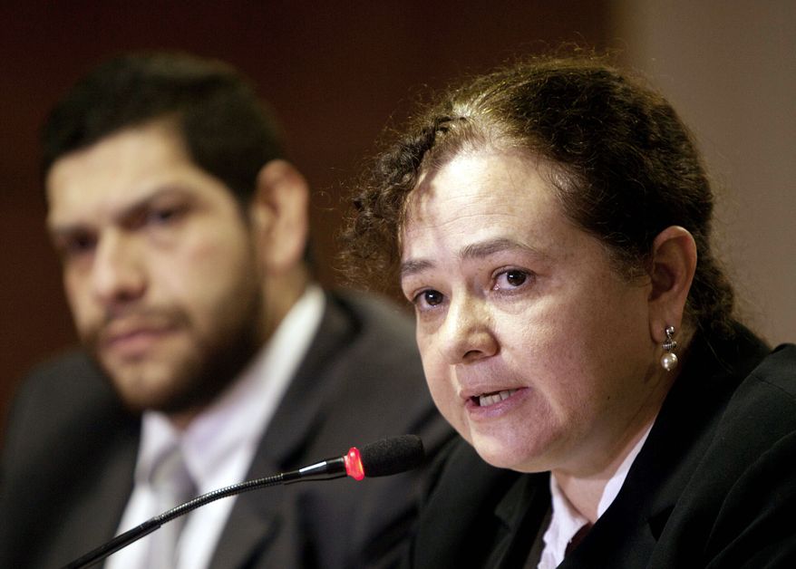 Guatemala Attorney General Claudia Paz y Paz is an aggressive prosecutor who gets support from the United States and other countries that provide aid to Guatemala. Arturo Aguilar is her secretary. (Associated Press)