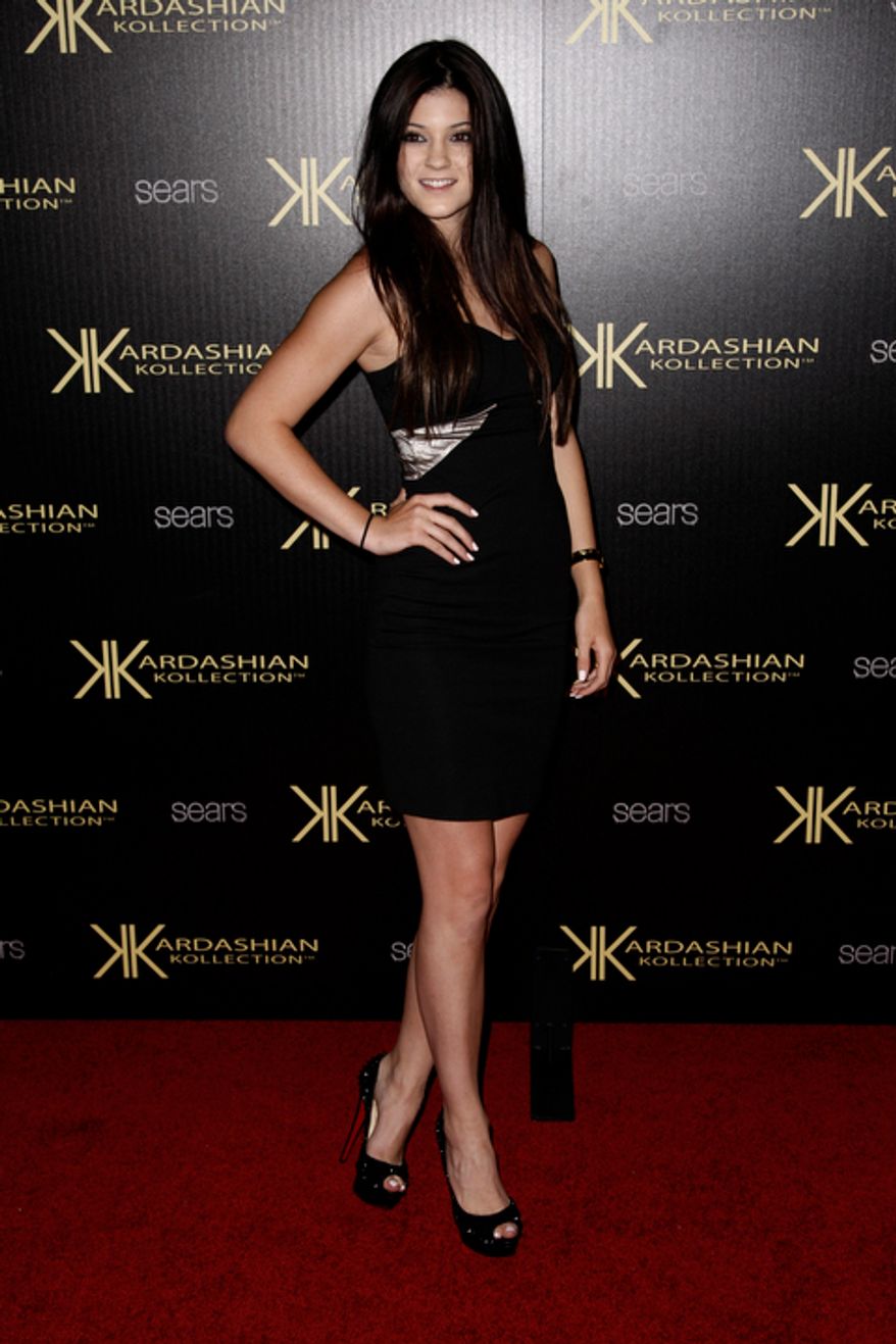 Kylie Jenner arrives at the Kardashian Kollection launch party in Los Angeles, Wednesday, Aug. 17, 2011. The Kardashian Kollection designed by the Kardashian sisters is available at Sears. (AP Photo/Matt Sayles)