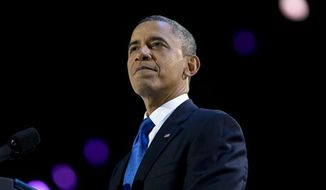 ** FILE ** In a Wednesday, Nov. 7, 2012 photo, President Obama pauses as he speaks at the election night party at McCormick Place, in Chicago. (AP Photo/Carolyn Kaster, File)