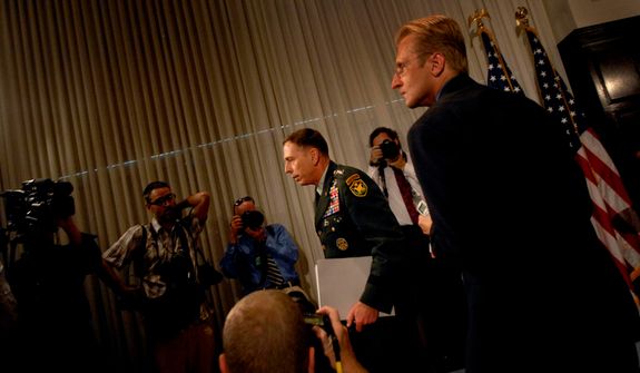**FILE** Gen. David Petraeus makes his exit following a Sept. 12, 2007, press conference on the current conditions in Iraq, at the National Press Club in D.C. (Rod Lamkey Jr./The Washington Times)