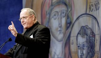 ** FILE ** Cardinal Timothy Dolan, of New York, president of the United States Conference of Catholic Bishops. (Associated Press)