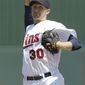 Minnesota Twins Scott Baker in a spring training baseball game in Fort Myers, Fla., Monday, March 26, 2012. (AP Photo/Charles Krupa)