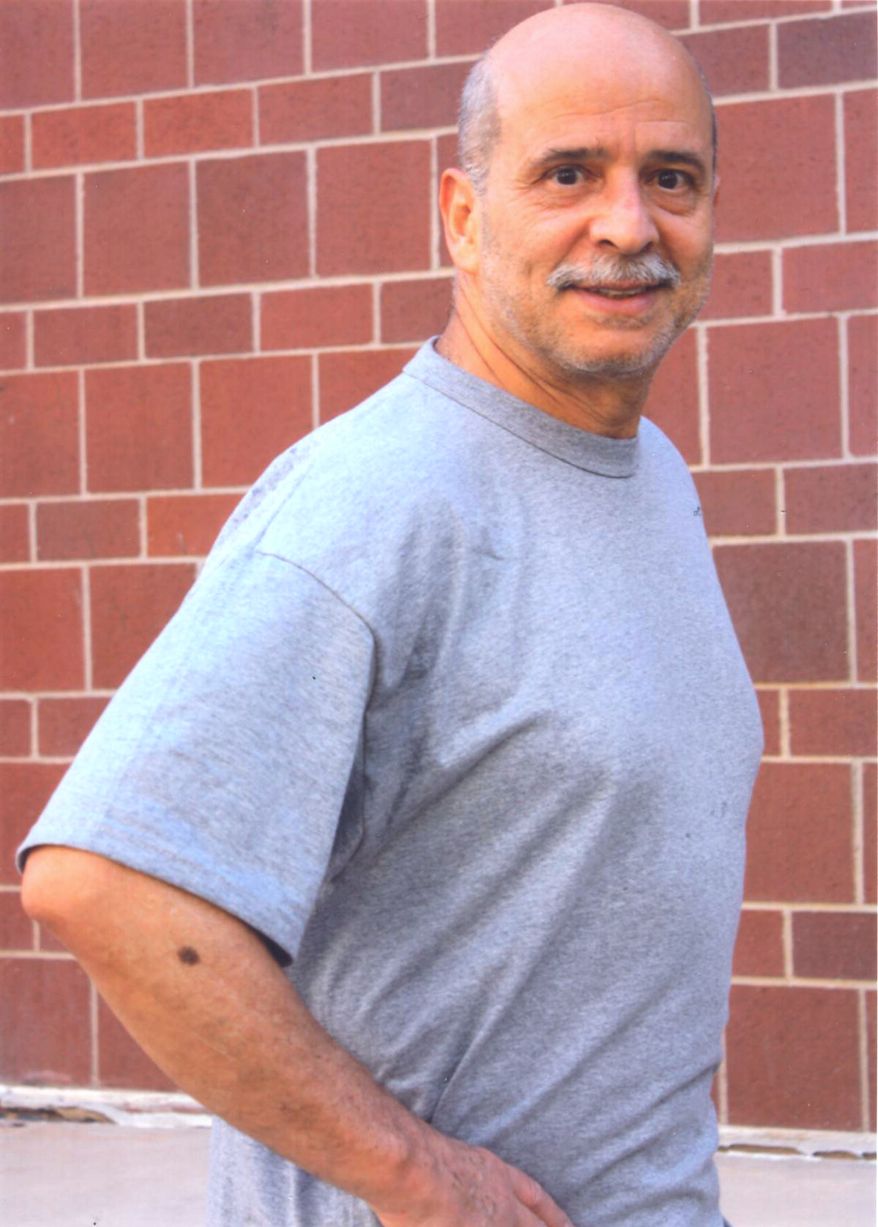 ** FILE ** Jailed rebel Ricardo Palmera, alias Simon Trinidad, can be seen at the U.S. federal penitentiary in Florence, Colo., in this Aug. 8, 2012, photo provided by Jaime Palmera. Palmera's journey from the Colombia's highest social circles to jungle battlegrounds and finally to a U.S. prison mirrors the complexity of the confrontation that the talks starting this week in Cuba are meant to end. The Revolutionary Armed Forces of Colombia, or FARC, considers him a prisoner of war. (AP Photo/Courtesy of Jaime Palmera)