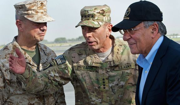 **FILE** Gen. John Allen (left), and Army Gen. David Petraeus (center), top U.S. commander in Afghanistan and incoming CIA Director, greet former CIA Director and new U.S. Defense Secretary Leon Panetta as he lands in Kabul, Afghanistan, on July 9, 2011. (Associated Press)