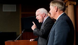 Sens. John McCain (R-Ariz.), center, and Lindsey Graham (R-S.C.), right, hold a press conference at the U.S. Capitol Building calling for a Senate Armed Services Committee Hearing on the Benghazi attack, Washington, D.C., Wednesday, November 14, 2012. (Andrew Harnik/The Washington Times)