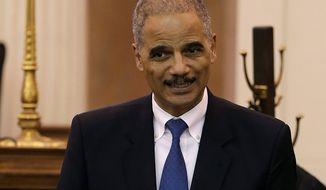 Attorney General Eric Holder speaks Nov. 13, 2012, in Des Moines, Iowa, during the investiture of Stephanie Rose, U.S. District Judge for the Southern District of Iowa. (Associated Press)