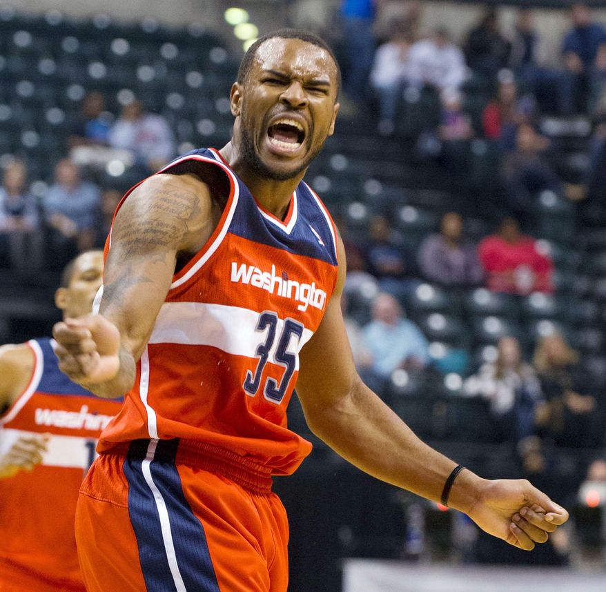 Forward Trevor Booker is averaging 8.1 points and 5.0 rebounds in the Wizards' 0-7 start. (Associated Press)