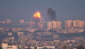 Explosion and smoke rises following an Israeli air strike in the northern Gaza Strip, seen from southern Israel near the Israel-Gaza border on Nov. 15, 2012. (Associated Press)