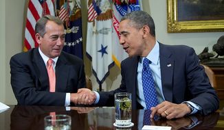 President Barack Obama shakes hands with House Speaker John Boehner of Ohio in the Roosevelt Room of the White House in Washington, Friday, Nov. 16, 2012, during a meeting to discuss the deficit and economy.  (AP Photo/Carolyn Kaster)