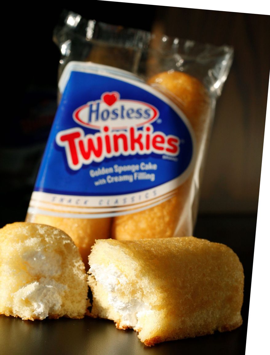 ** FILE ** This Jan. 10, 2012 photo shows Hostess Twinkies in New York. Twinkies first came onto the scene in 1930 and contained real fruit until rationing during World War II led to the vanilla cream Twinkie. (AP Photo/Mark Lennihan)