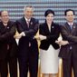From left, Thein Sein, president of Myanmar; Benigno Aquino III, president of the Philippines; Lee Hsien Loong, prime minister of Singapore; Yingluck Shinawatra, prime minister of Thailand; Nguyen Tan Dung, prime minister of Vietnam; and Hun Sen, prime minister of Cambodia, join hands after a signing ceremony of adoption of the ASEAN Human Rights Declaration during a summit for the association in Phnom Penh, Cambodia, on Sunday. (Associated Press)