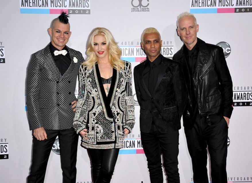 Musical group No Doubt, from left, Adrian Young, Gwen Stefani, Tony Kanal and Tom Dumont arrive at the 40th Anniversary American Music Awards on Sunday, Nov. 18, 2012, in Los Angeles. (Photo by Jordan Strauss/Invision/AP)