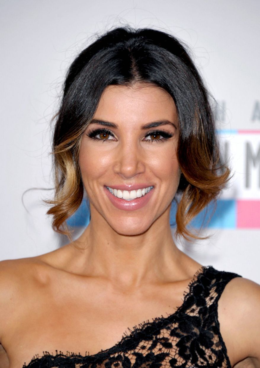 Adrianna Costa arrives at the 40th Anniversary American Music Awards on Sunday, Nov. 18, 2012, in Los Angeles. (Photo by John Shearer/Invision/AP)