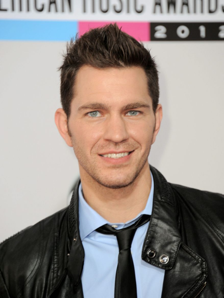 Andy Grammer arrives at the 40th Anniversary American Music Awards on Sunday Nov. 18, 2012, in Los Angeles. (Photo by Jordan Strauss/Invision/AP)