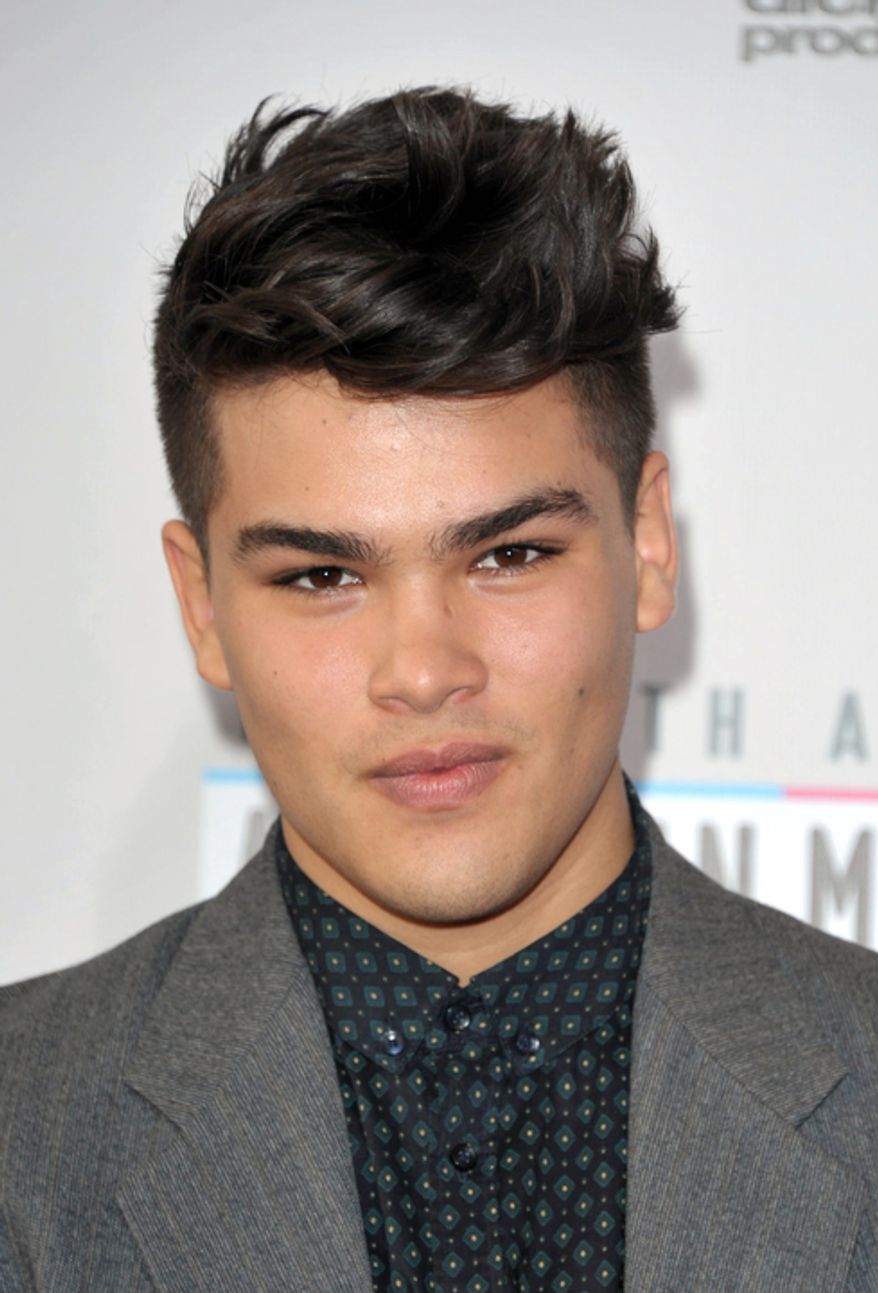 Romeo Testa arrives at the 40th Anniversary American Music Awards on Sunday, Nov. 18, 2012, in Los Angeles. (Photo by John Shearer/Invision/AP)