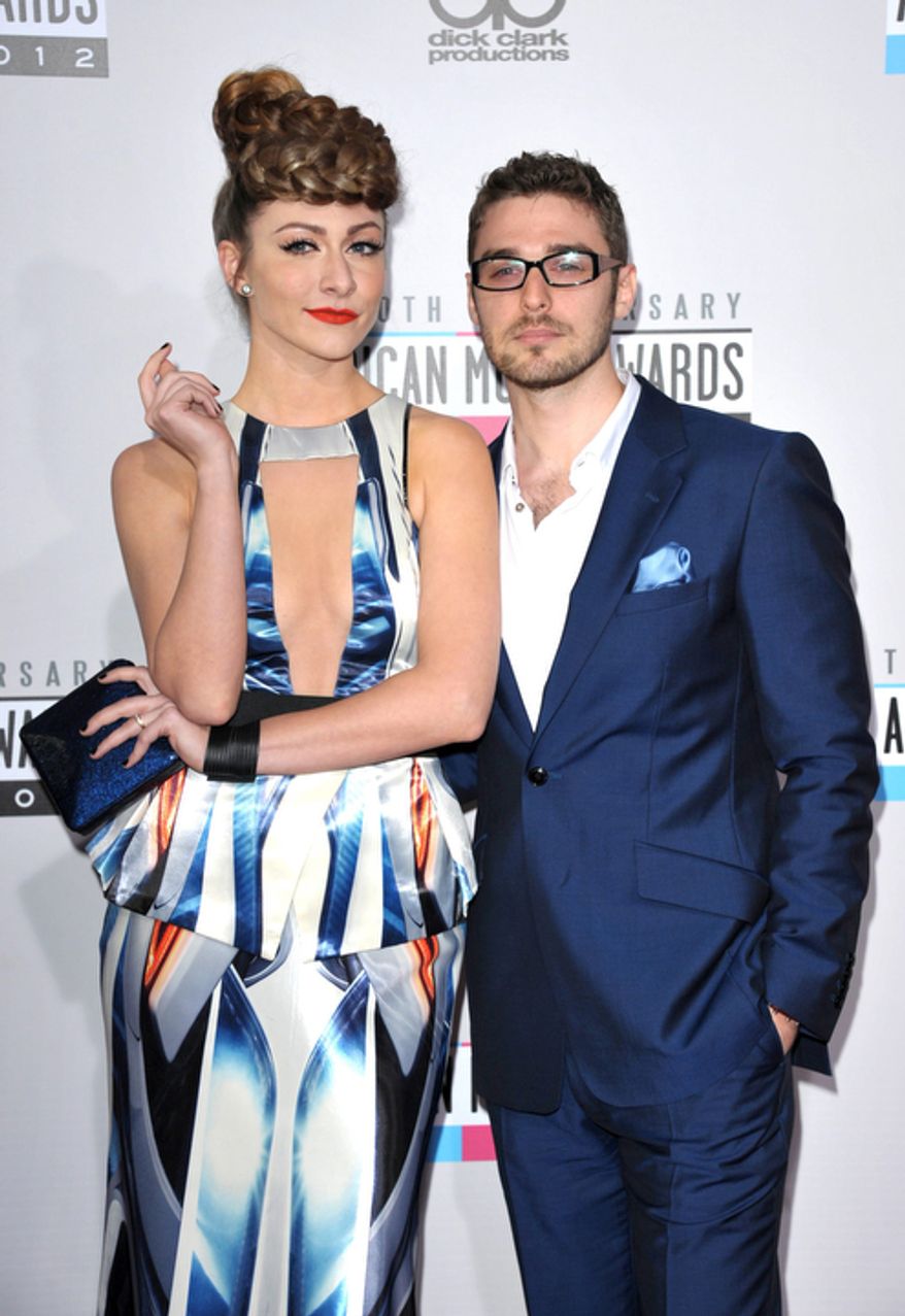 Amy Heidemann, left, and Nick Noonan from the band Karmin arrive at the 40th Anniversary American Music Awards on Sunday, Nov. 18, 2012, in Los Angeles. (Photo by John Shearer/Invision/AP)
