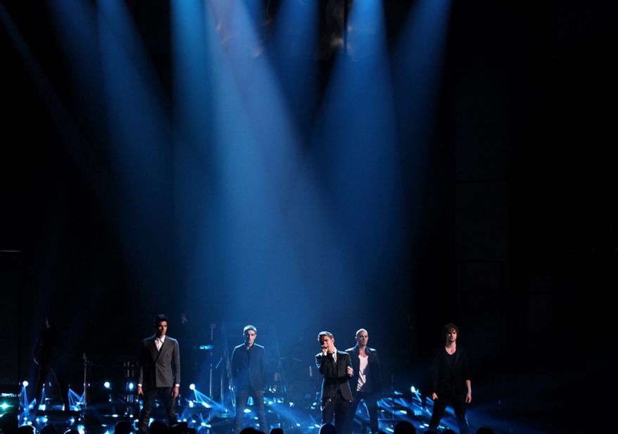 The Wanted, from left, Siva Kaneswaran,Tom Parker, Nathan Sykes, Max George and Jay McGuiness perform at the 40th Annual American Music Awards on Sunday, Nov. 18, 2012, in Los Angeles. (Photo by Matt Sayles/Invision/AP)
