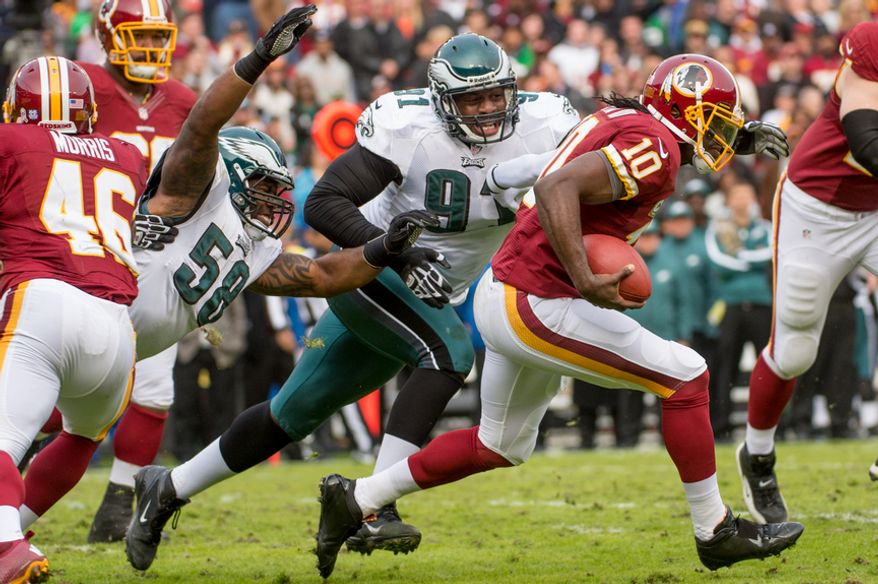 Washington Redskins quarterback Robert Griffin III (10) scrambles in the second quarter as the Washington Redskins play the Philadelphia Eagles at FedEx Field, Landover, Md., Sunday, Nov. 18, 2012. (Andrew Harnik/The Washington Times)