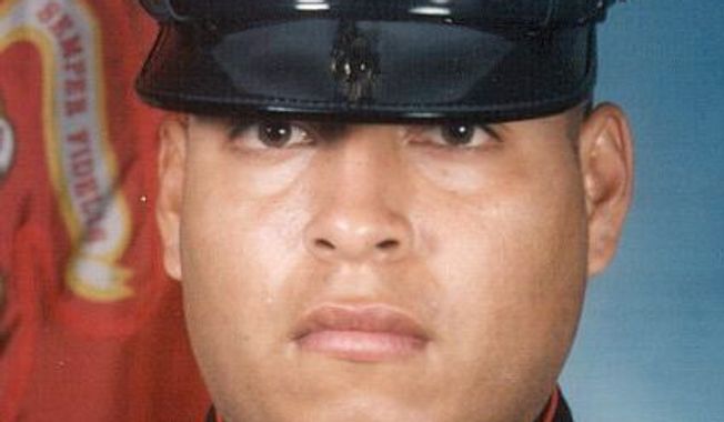 This undated photo released by the U.S. Marines, shows Sgt. Rafael Peralta, 25. Peralta is being considered for a posthumous Medal of Honor, the United States&#x27; highest military award. Peralta was shot during a house-to-house search in Fallujah. Lying wounded on the floor of a home, he grabbed a grenade that had been lobbed in by an insurgent. The blast killed him. &quot;If he wouldn&#x27;t have scooped up the grenade, the other three of us in the room that day would have been killed,&quot; said former Cpl. Robert Reynolds, who was in Peralta&#x27;s squad. (AP Photo/U.S. Marines)