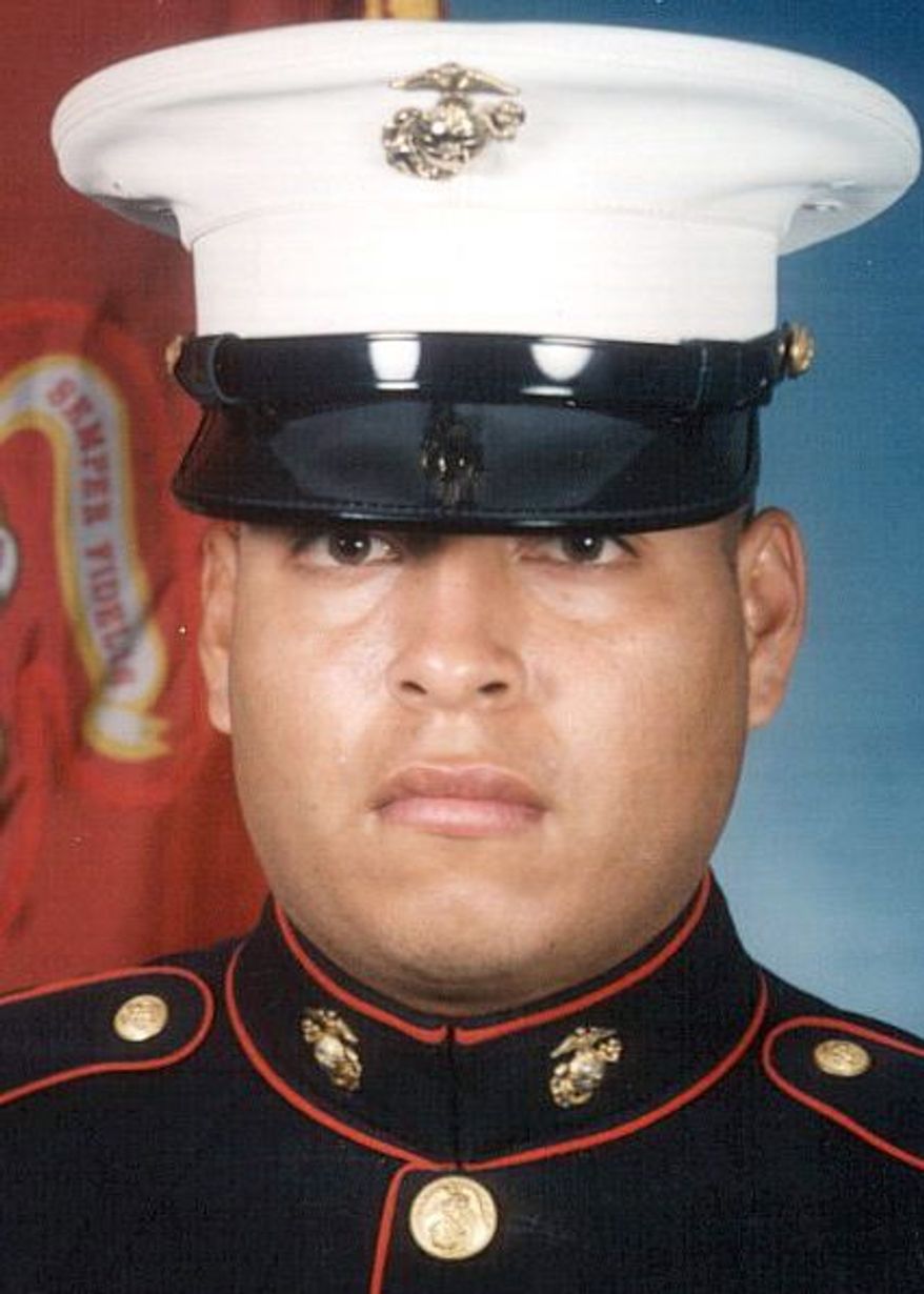 This undated photo released by the U.S. Marines, shows Sgt. Rafael Peralta, 25. Peralta is being considered for a posthumous Medal of Honor, the United States' highest military award. Peralta was shot during a house-to-house search in Fallujah. Lying wounded on the floor of a home, he grabbed a grenade that had been lobbed in by an insurgent. The blast killed him. "If he wouldn't have scooped up the grenade, the other three of us in the room that day would have been killed," said former Cpl. Robert Reynolds, who was in Peralta's squad. (AP Photo/U.S. Marines)