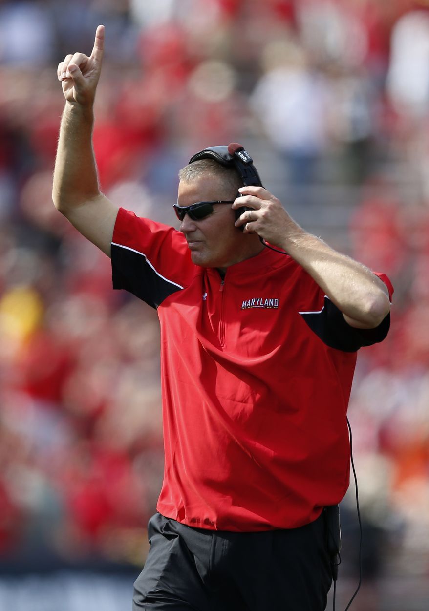 FILE - This Sept. 15, 2012 file photo shows Maryland head coach Randy Edsall reacts after his team scored a touchdown in the second half of an NCAA college football game against Connecticut in College Park, Md. Maryland is set to announce it is joining the Big Ten. The Big Ten Network tweeted that it will cover the school's news conference Monday afternoon, Nov. 19, 2012, to announce Maryland's decision to leave the Atlantic Coast Conference. (AP Photo/Patrick Semansky, File)