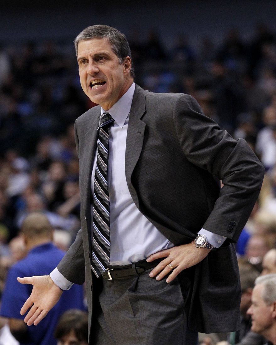 Washington Wizards head coach Randy Wittman shouts at an official after a call in the first half of an NBA basketball game against the Dallas Mavericks, Wednesday, Nov. 14, 2012, in Dallas. (AP Photo/Tony Gutierrez)