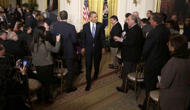 **FILE** President Obama leaves the East Room of the White House on Nov. 14, 2012, following his first post-election news conference. (Associated Press)