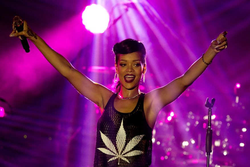 Barbadian singer Rihanna performs during the fifth stop of her worldwide "777" tour at the E-Werk club in Berlin on Nov. 19, 2012. (Associated Press)