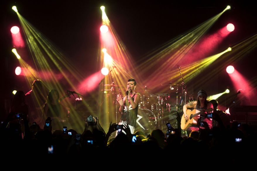 Barbadian singer Rihanna performs during the fifth stop of her "777" worldwide tour at the E-Werk club in Berlin on Nov. 19, 2012. (Associated Press)