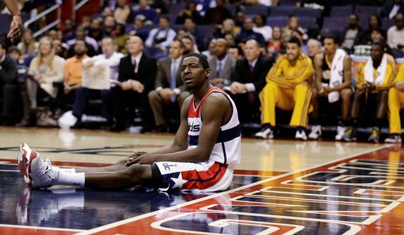 Washington Wizards guard Jordan Crawford pauses on the court during the first half of the Pacers&#39; 96-89 road win on Nov. 19, 2012. (Associated Press)