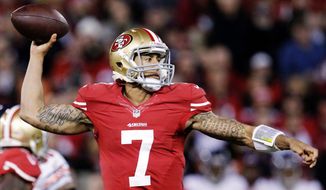 San Francisco quarterback Colin Kaepernick showed a cool demeanor and a hot hand against Chicago on Monday night. (Associated Press)