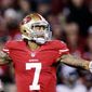 San Francisco quarterback Colin Kaepernick showed a cool demeanor and a hot hand against Chicago on Monday night. (Associated Press)