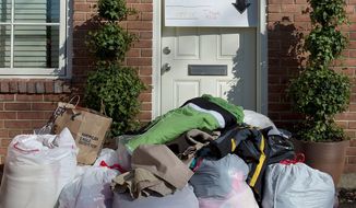 &quot;It was in an avalanche,&quot; Andrew said of the donations left at the door of the Audas family’s Bethesda home. (Barbara L. Salisbury/The Washington Times)