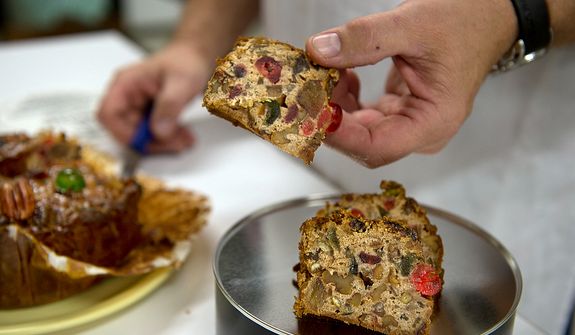 The fruitcakes made by the monks at Holy Cross Abbey in Berryville, Va. are made with two-thirds candied fruits and nuts, meaning there is less cake batter to dry out. According to bakery manager Ernie Polanskas, the monks make about 10,000 fruitcakes from January to September, and ship most of them out during the Christmas season. He says they use an old Betty Crocker recipe that they have tweaked some over the years. It includes both sherry and brandy in addition to the candied fruits and walnuts. (Barbara L. Salisbury/The Washington Times)