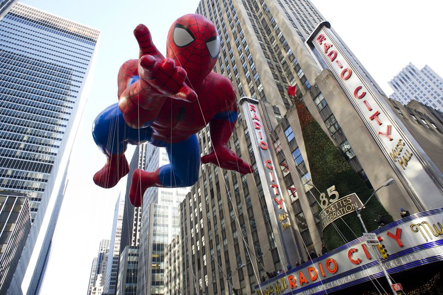 The Spider-Man balloon floats in the Macy's Thanksgiving Day Parade in New York in New York, Thursday, Nov. 22, 2012. The annual Macy's Thanksgiving Day Parade kicked off in New York on Thursday, putting a festive mood in the air in a city still coping with the aftermath of Superstorm Sandy. (AP Photo/Charles Sykes)